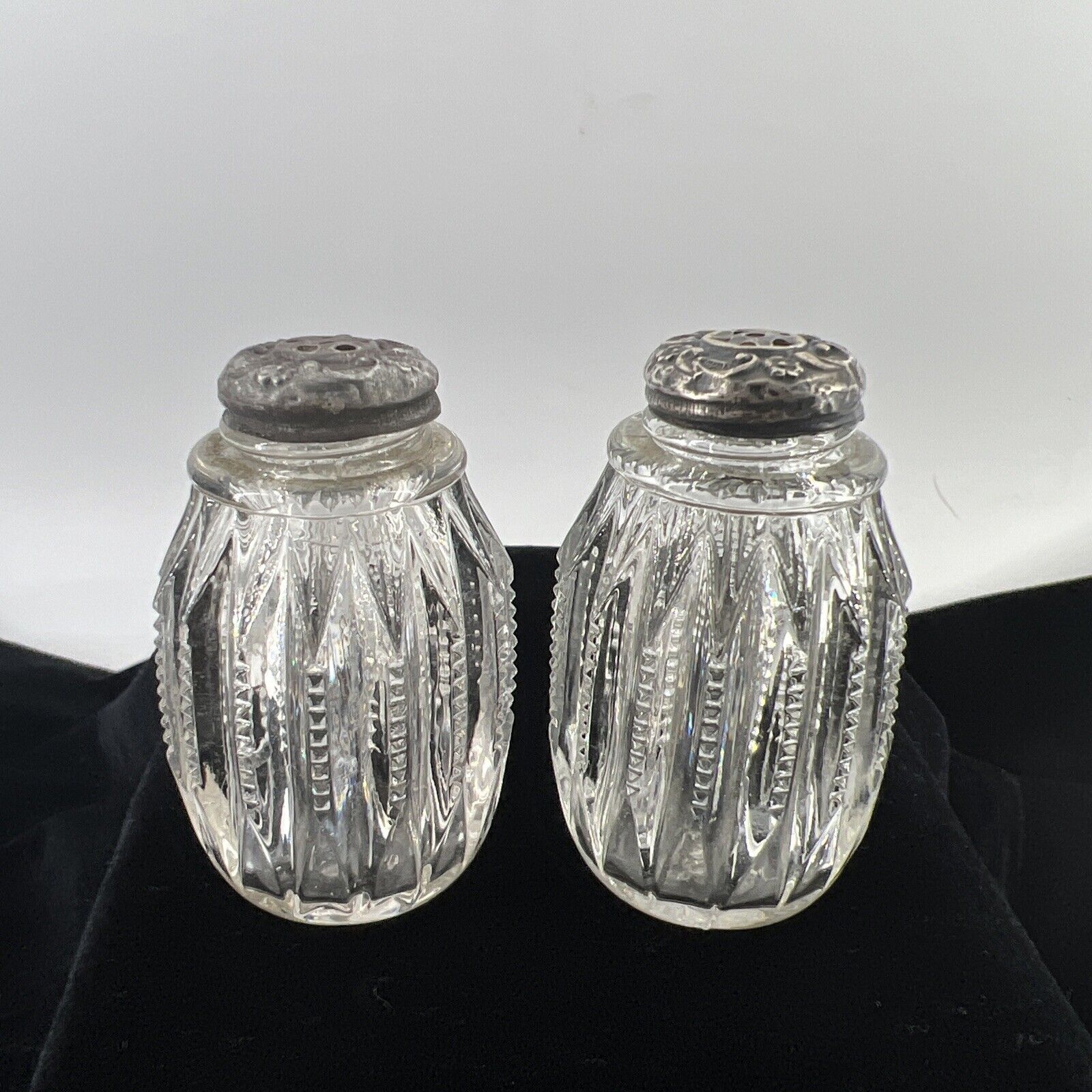 Antique Cut Glass Salt & Pepper Shakers Silver Repousse Tops