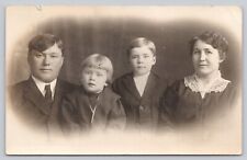 RPPC Early 1900's Of Family Father, Mother, And Two Sons In Studio picture
