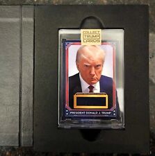 Official Collect Trump Cards physical card with piece of Mugshot suit picture