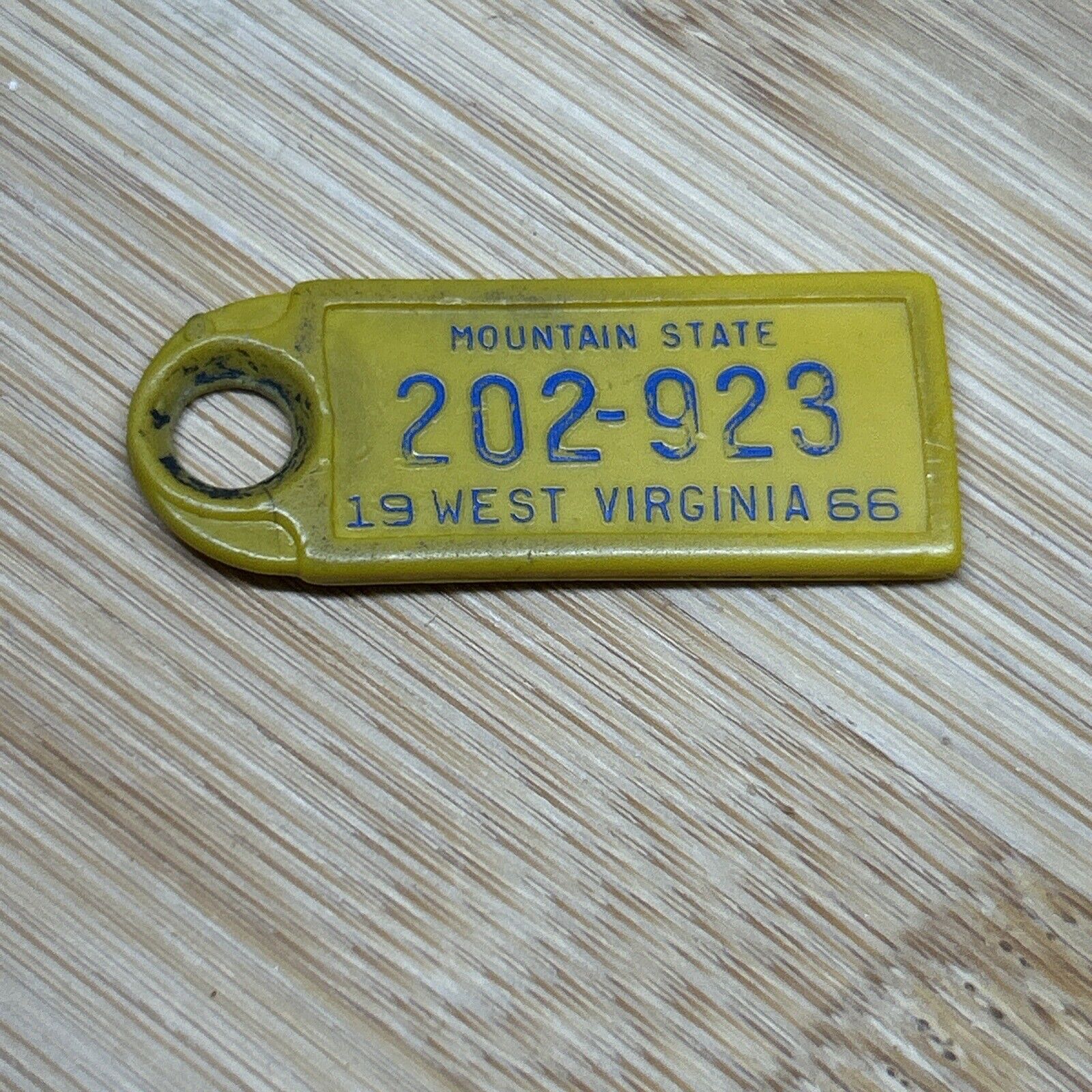 1966 West Virginia Mini License Keychain DAV Tag (202-923)
