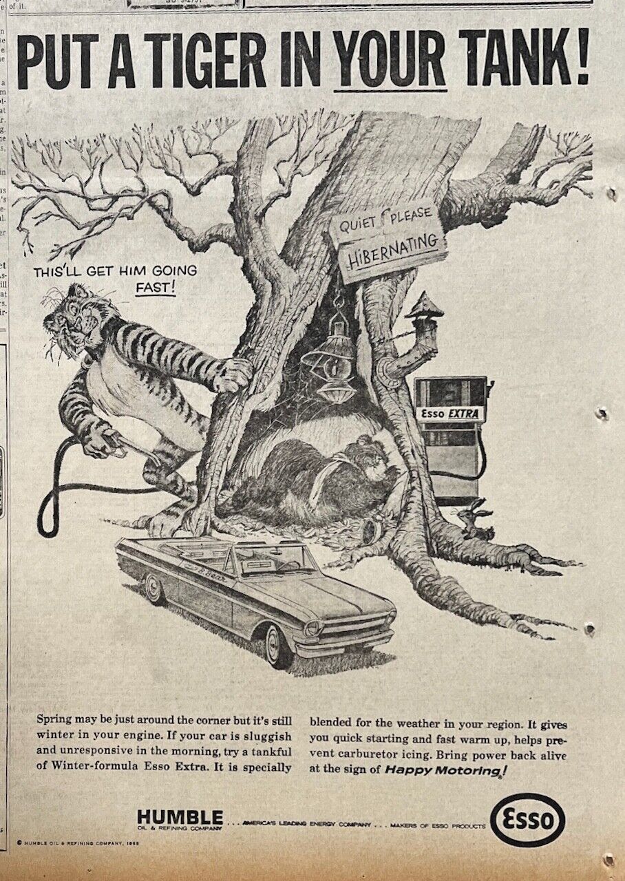 1965 newspaper ad for Esso/Humble - Tiger wakes up hibernating bear, B.Jones art