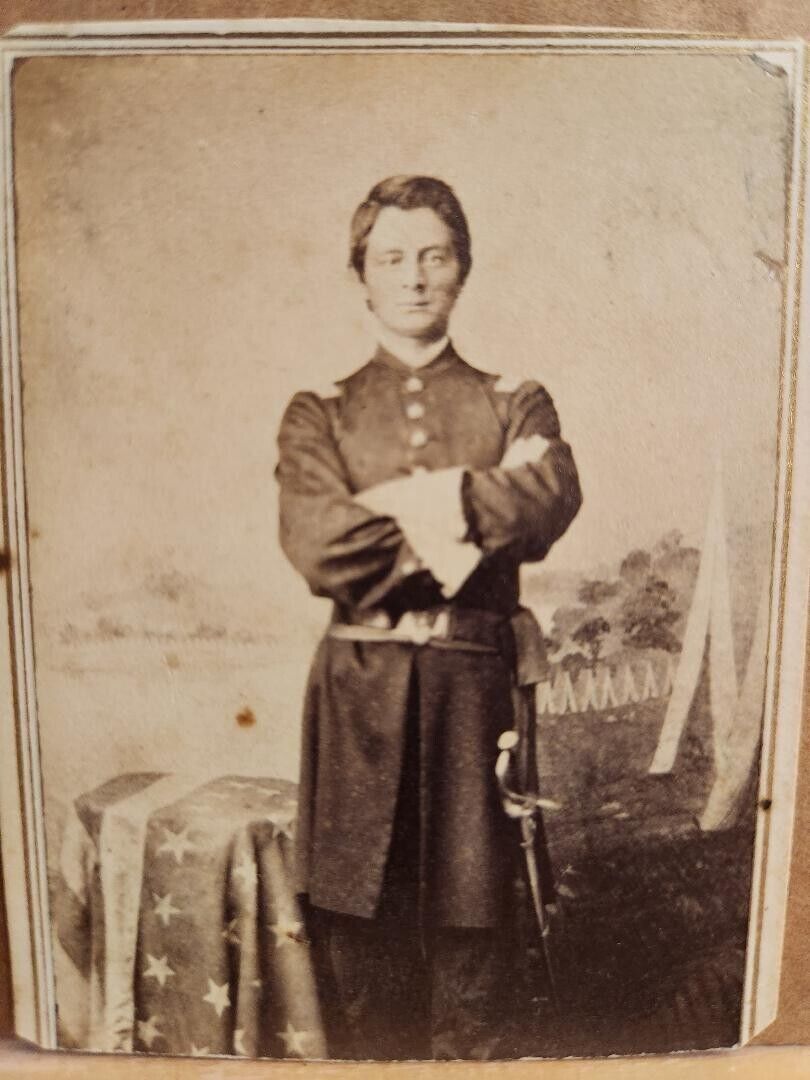 Cdv of unidentified full standing officer wearing gauntlets & armed with sword