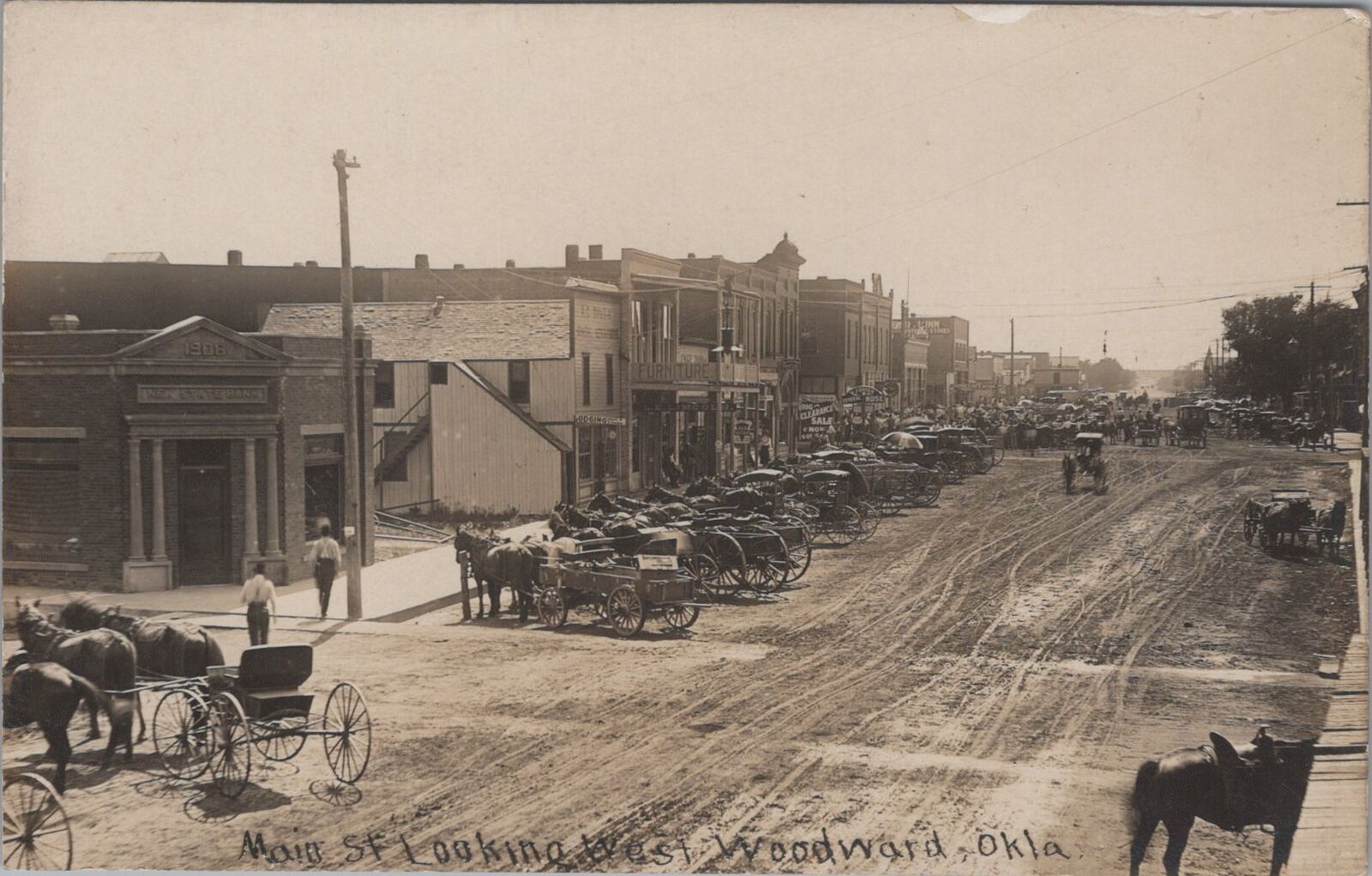 Main Street Looking West, Woodward, Oklahoma New State Bank 1910s RPPC Postcard