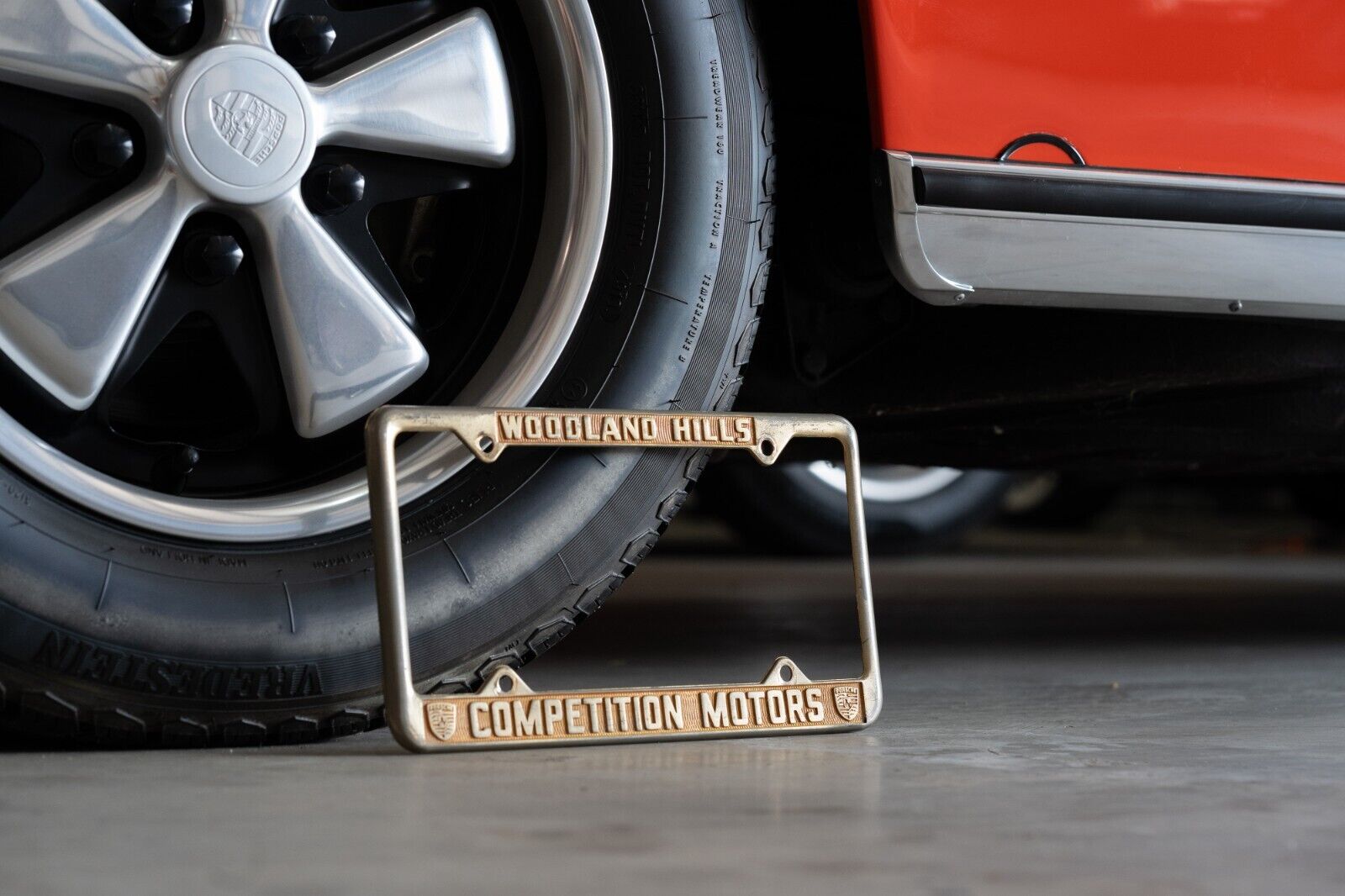 Authentic Competition Motors Porsche Woodland Hills Gold License Plate Frame