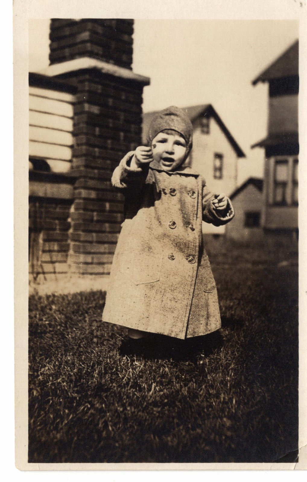 Postcard RPPC Little Boy Outside Winter Coat Houses -9498