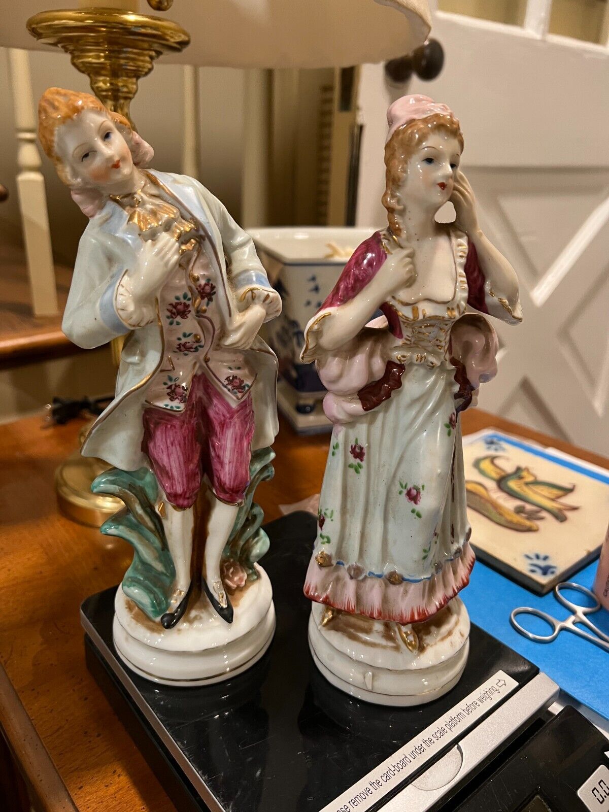 vintage porcelian figurines of 18th century ?french lady and gentleman.