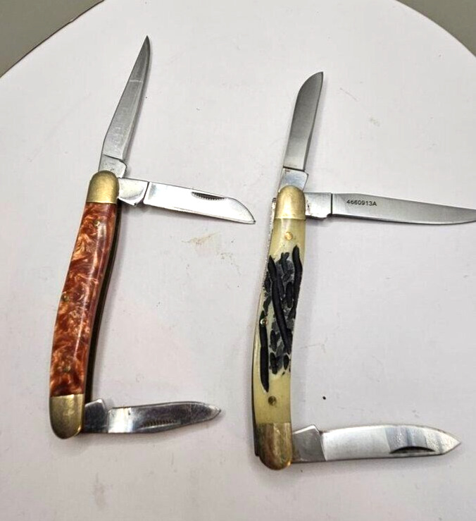 Lot of 2  Pocket Knives  Winchester 4660618a and  Elk Ridge ER953br 
