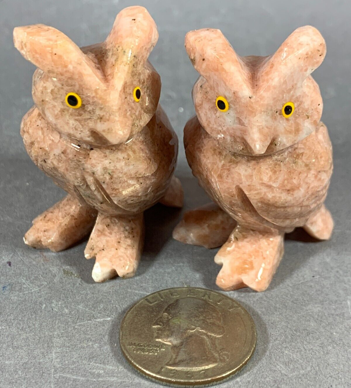OWLS, A PAIR OF DOLOMITE OWLS IN A SALMON COLOR, HAND CARVED WITH MUCH DETAIL