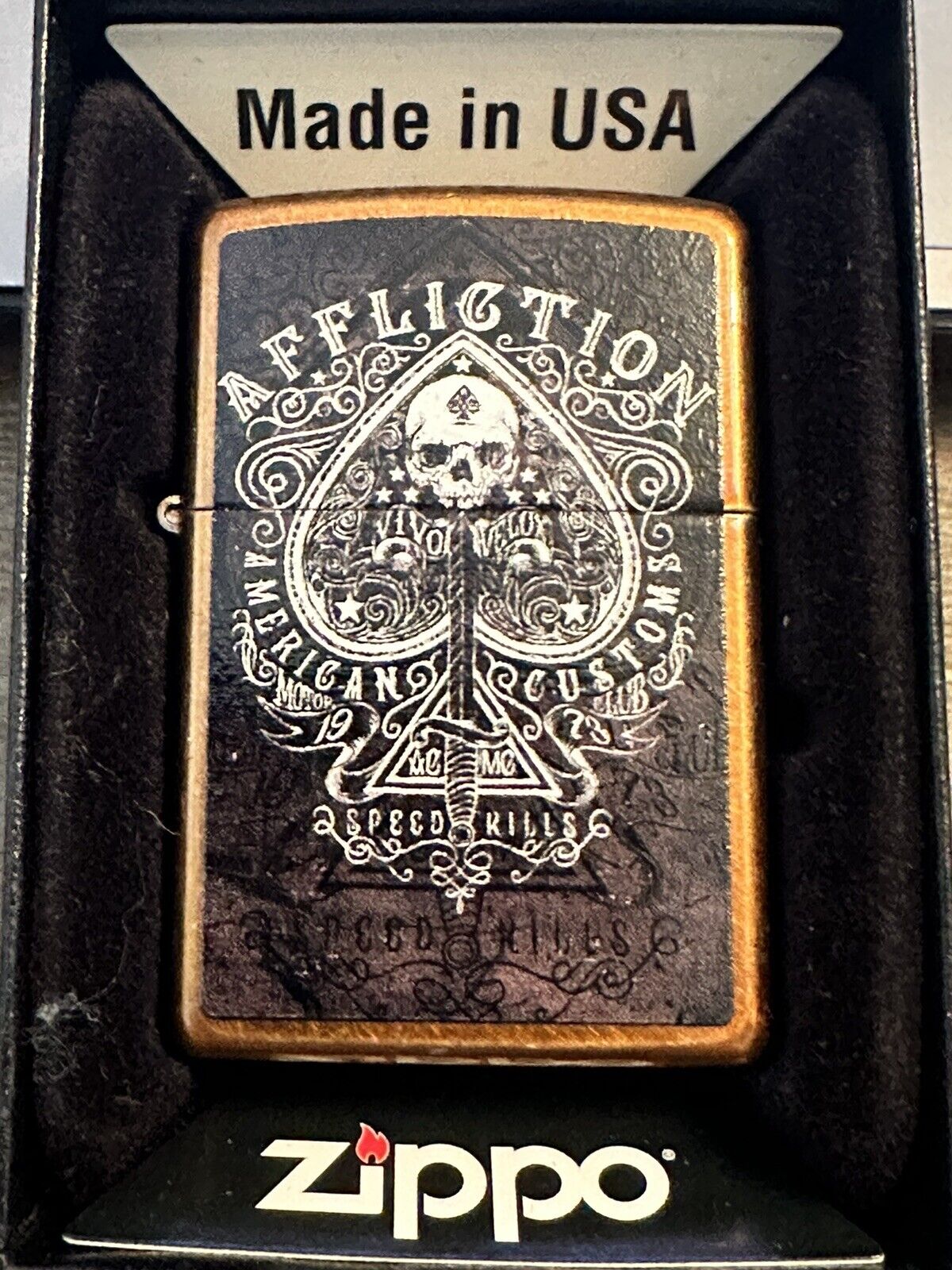 Affliction Zippo Lighter , Brand New In the Box .