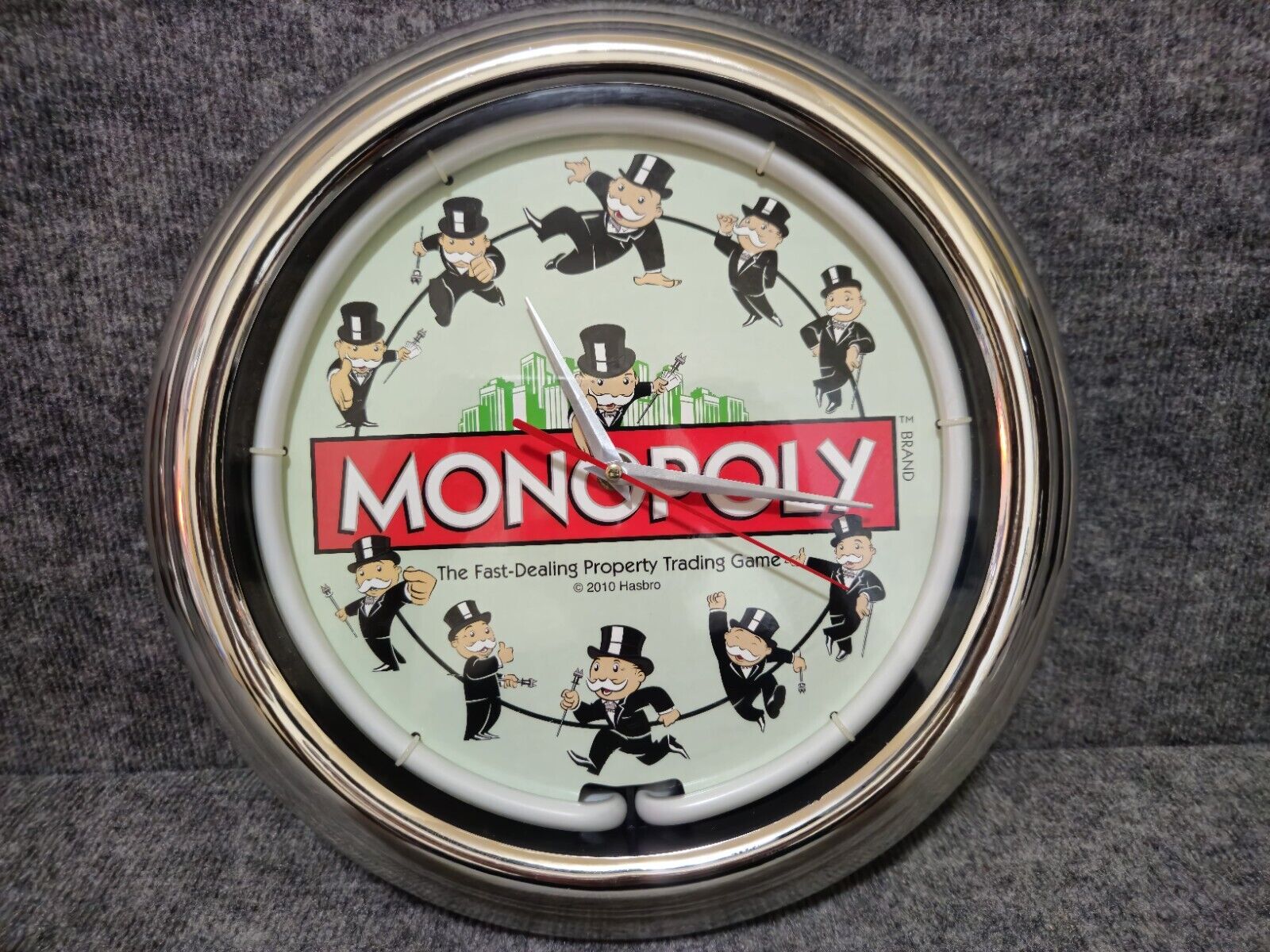 Hasbro 2010 MONOPOLY The Fast Dealing Property Trading Game Neon Light WallClock