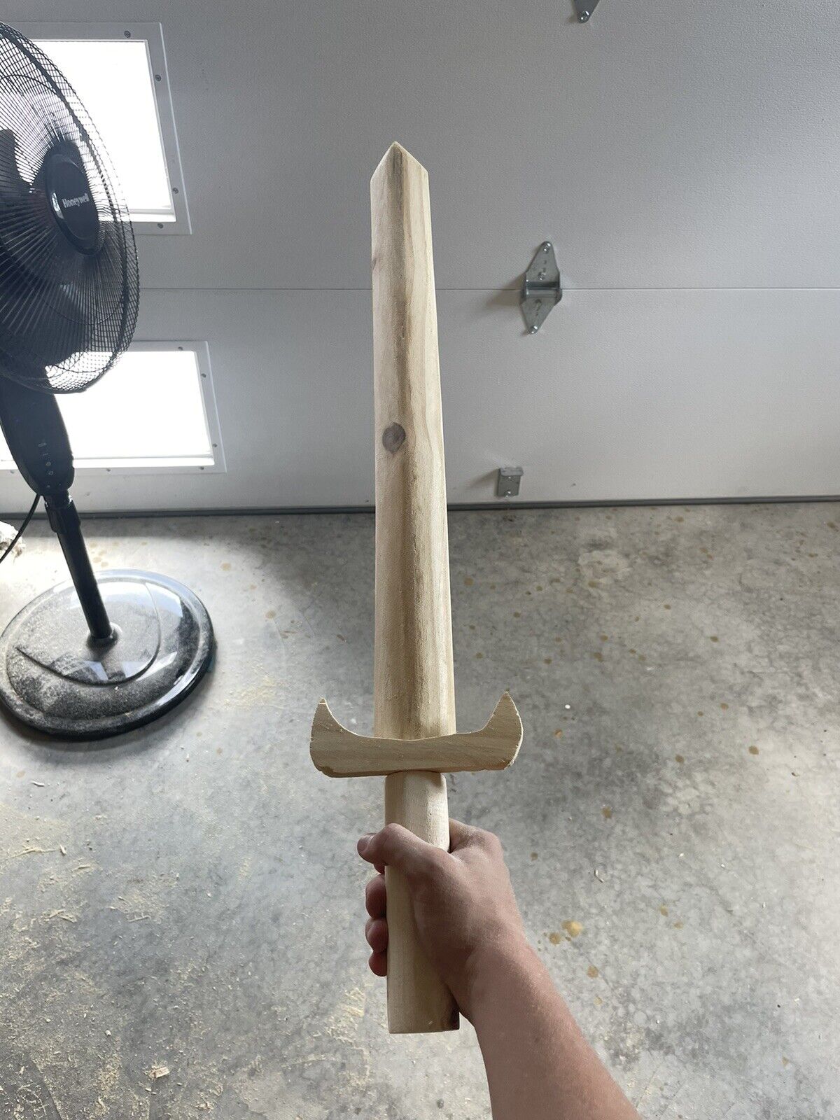 Wooden practice or decorative sword send designs and i will do them.