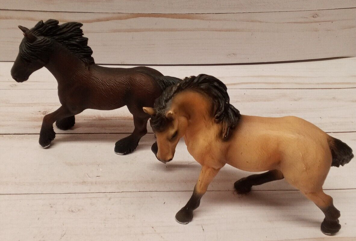 Schleich male and female lot of 2 tan and black stallions silver horseshoes 4\