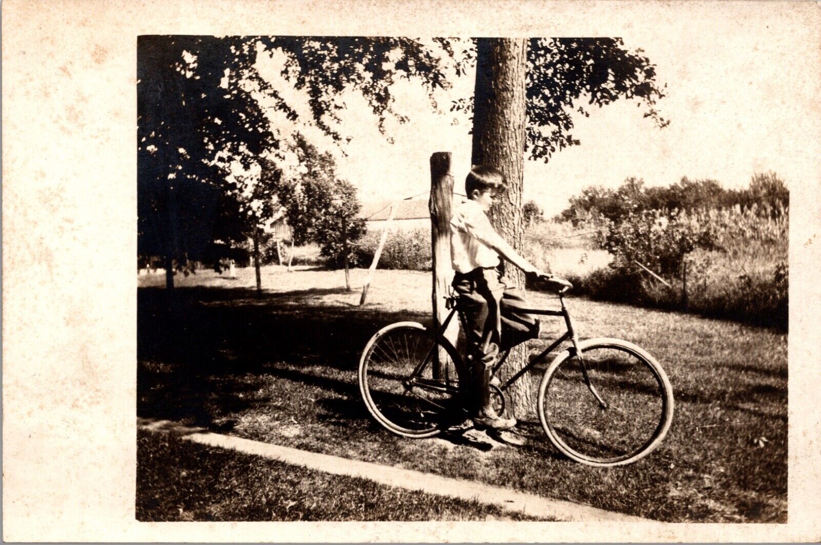 Real Photo Postcard Young Boy with a Bicycle