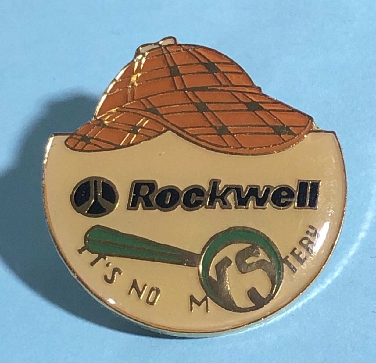 Rockwell International  ‘It’s No Mystery’ Advertising Pin