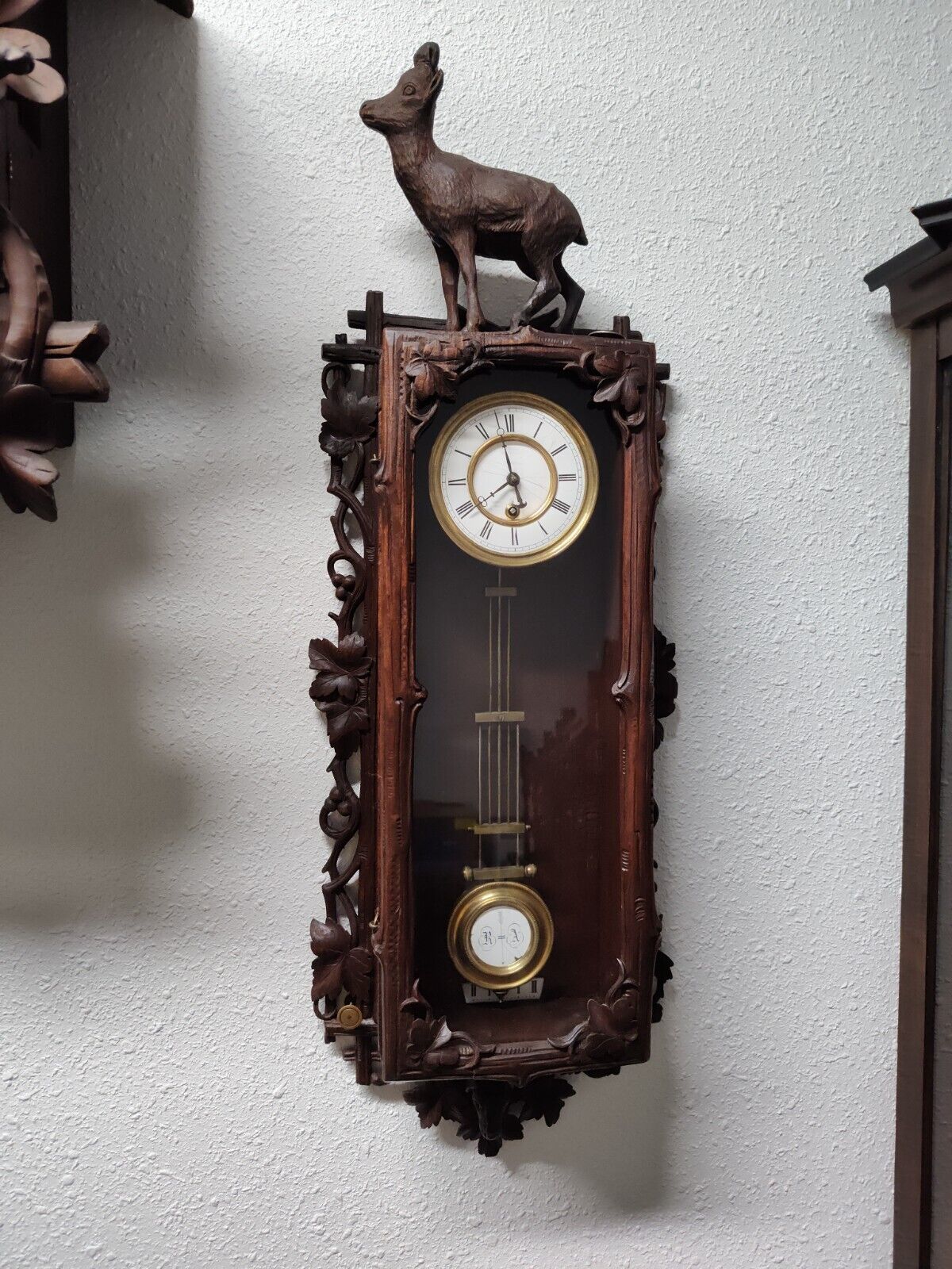 ANTIQUE BLACK FOREST CARVED MINI WALL CLOCK