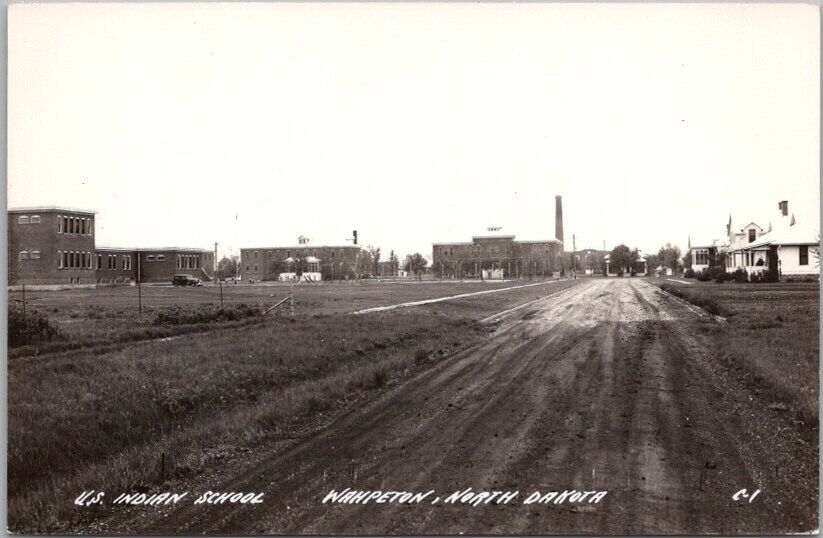 1940s WAHPETON, North Dakota RPPC Photo Postcard U.S. INDIAN SCHOOL Street View
