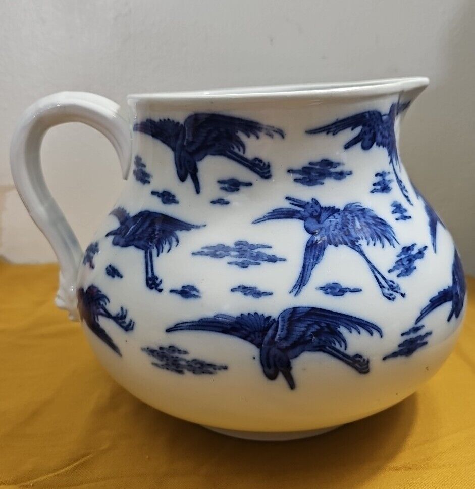 An Aesthetic Movement jug in the manner of Dr Christopher Dresser Stamped Minton