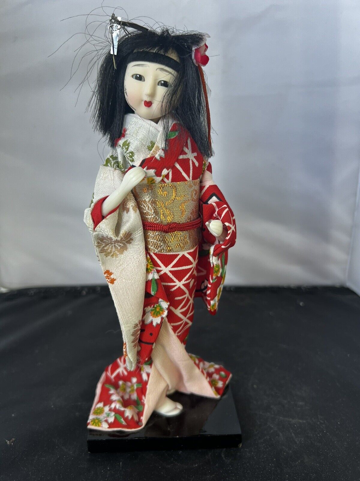 Vintage Ceramic Face Geisha Doll on Wood Platform 9\