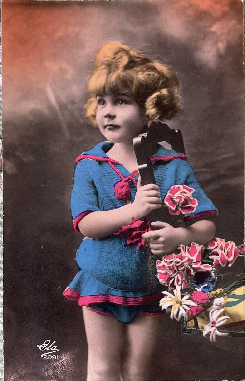 Vintage RPPC Postcard~Girl With Flowers. C002