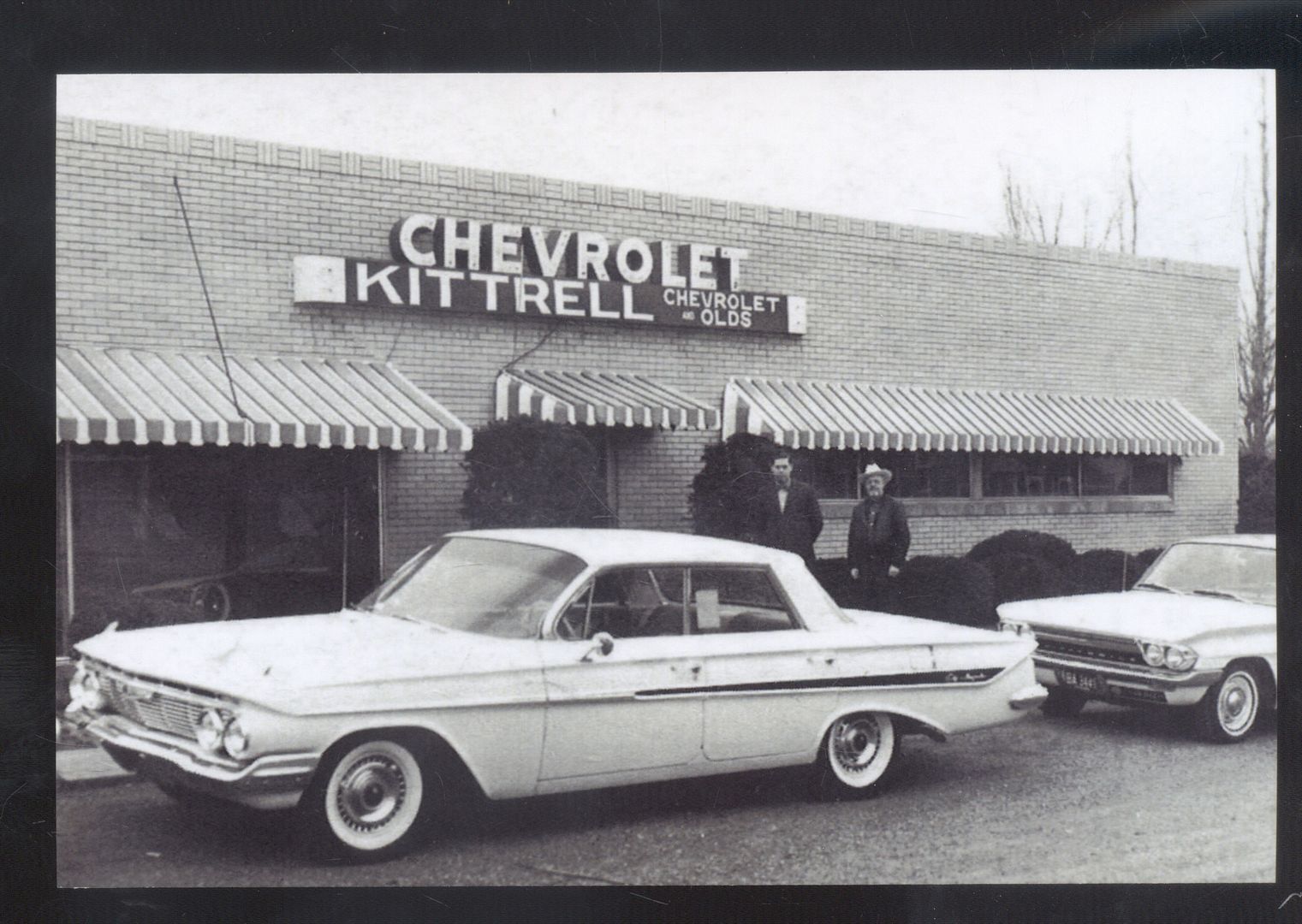 REAL PHOTO GENESEO ILLINOIS KITTRELL CHEVROLET CAR DEALER 1961 POSTCARD COPY