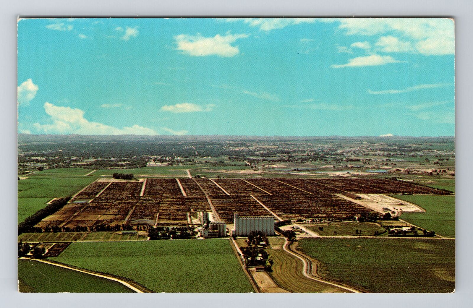 Greeley CO-Colorado, Monfort Feed Lots Inc Vintage c1973 Souvenir Postcard