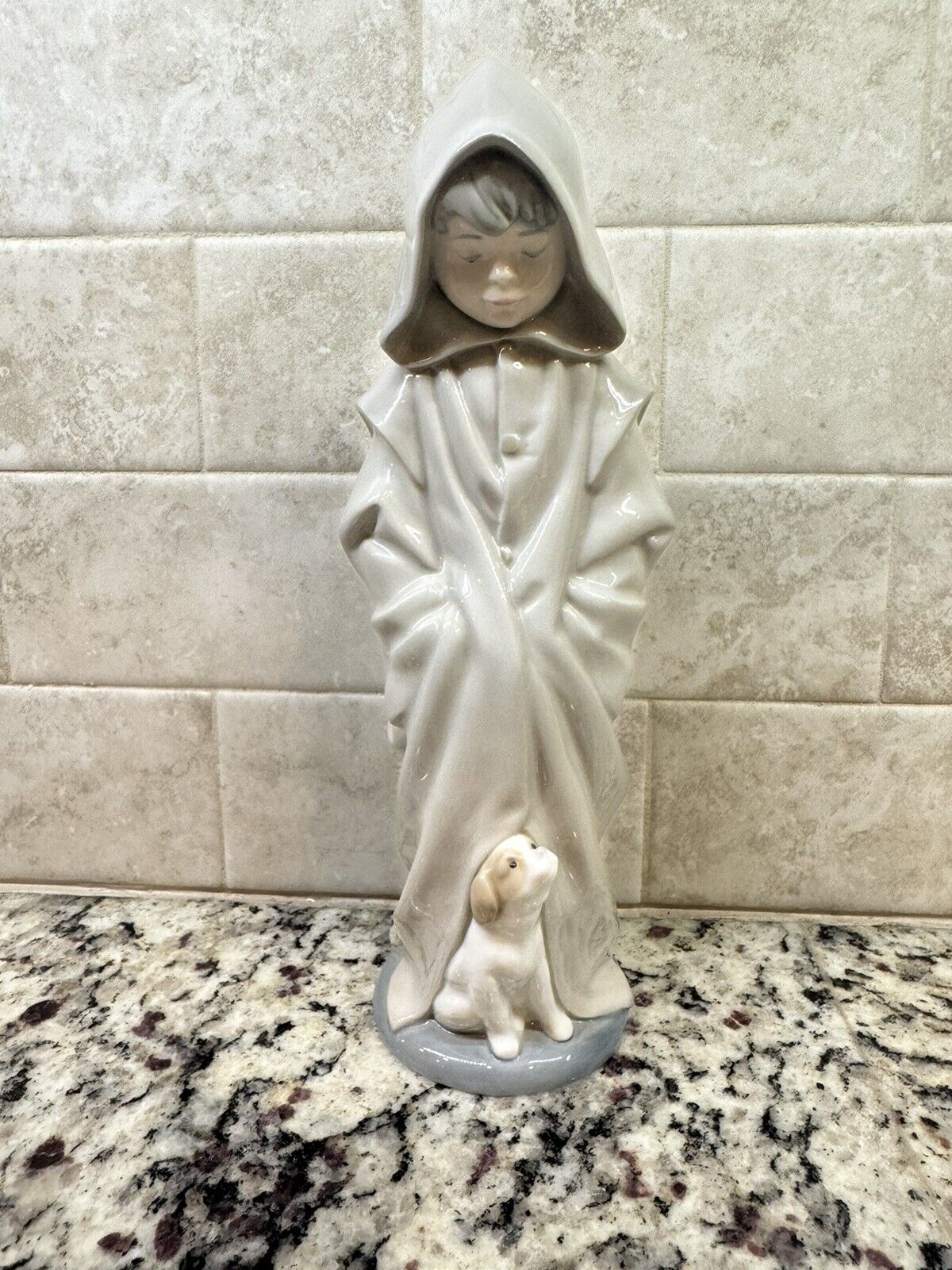 Lladro  NAO 1982 figurine boy in hooded robe with puppy 10” tall