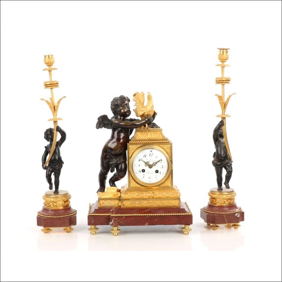 Antique Mantel Clock. Gilt and Patinated Bronze. France, 19th Century