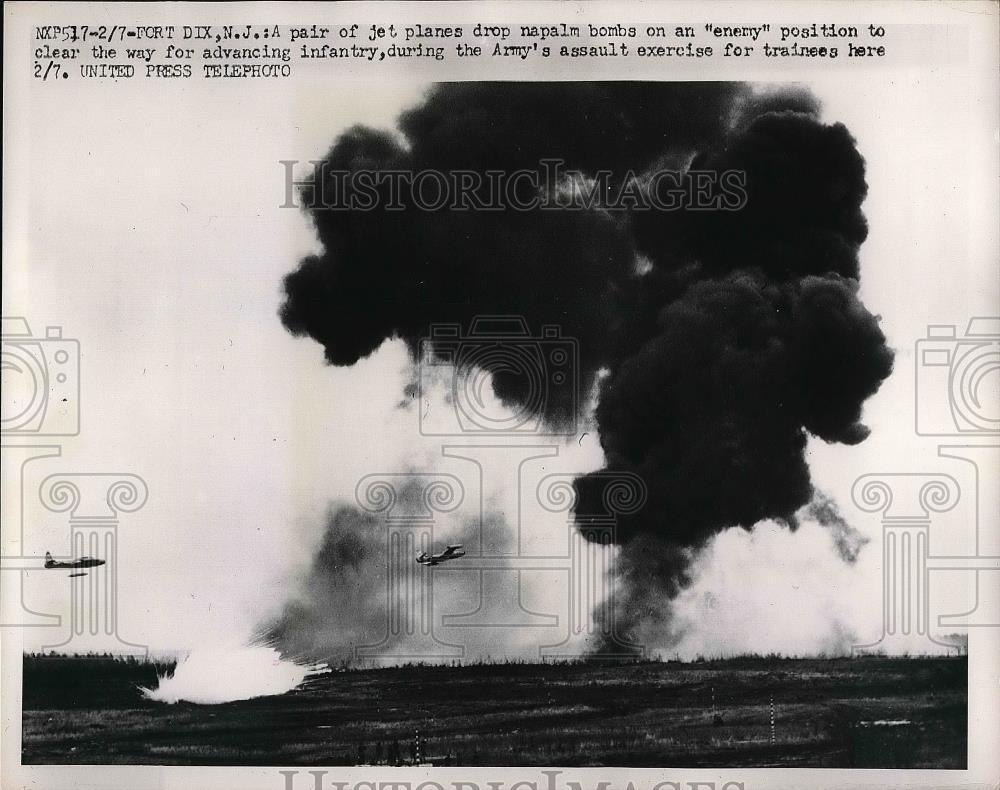 1952 Press Photo Ft Dix, N.J. Jets drop bombs in a infantry exercise