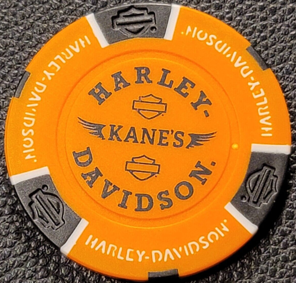 KANE'S HD - BRIT COLUMBIA, CANADA (Org/Blk) Internat'l Harley Poker Chip (CLSED)