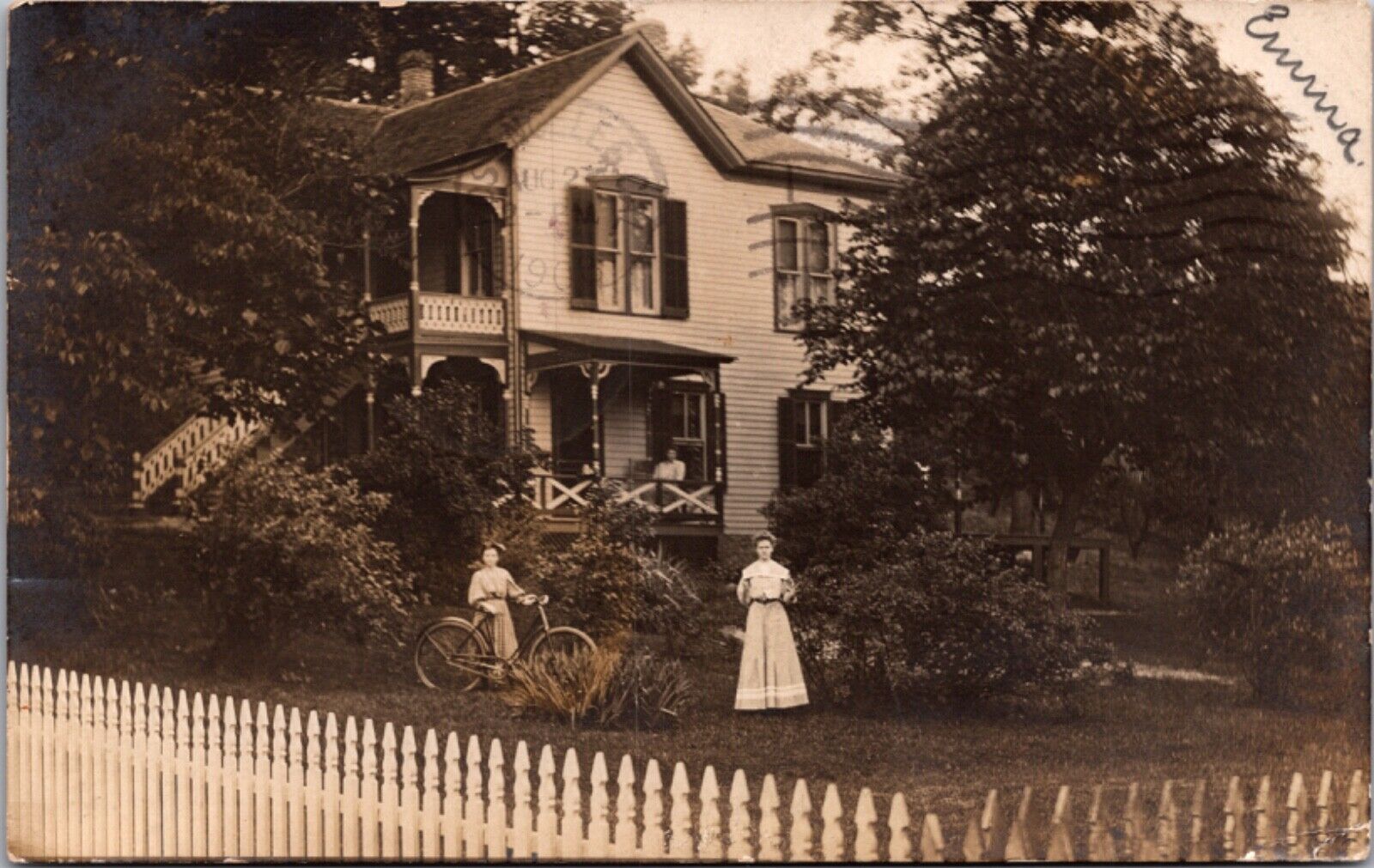 RPPC Man on House Porch, Woman in Garden, Girl with a Bicycle in Front Yard