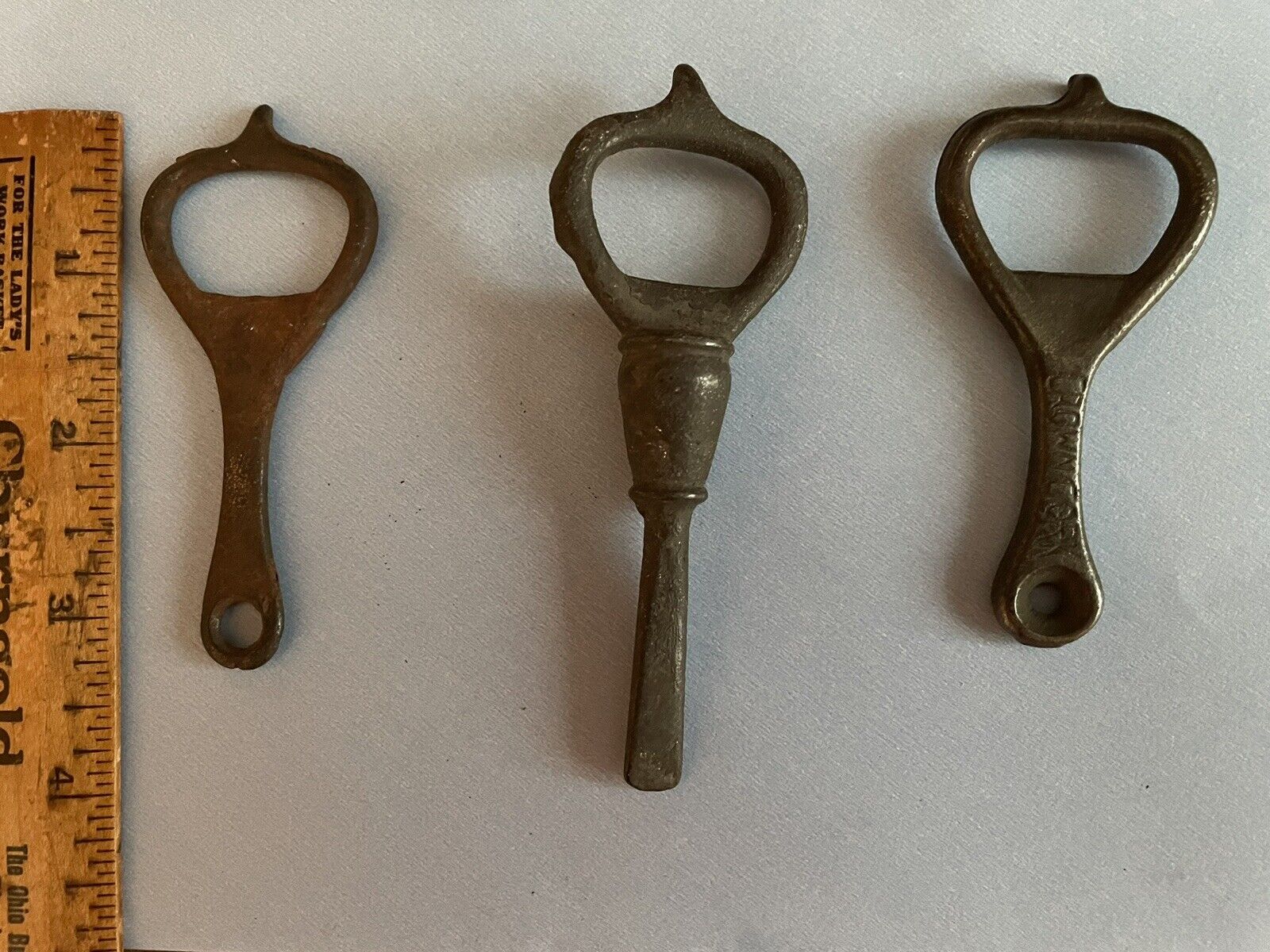 antique cast iron bottle openers Lot Of 3