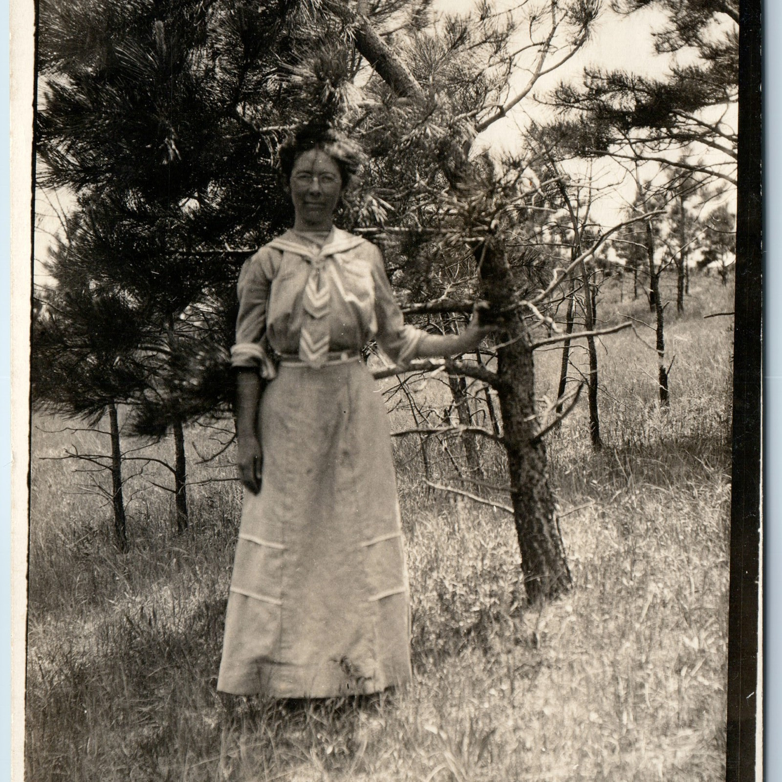 c1910s Lovely Young Lady RPPC Outdoors +Bent Pine Tree Real Photo Aunt Kate A212