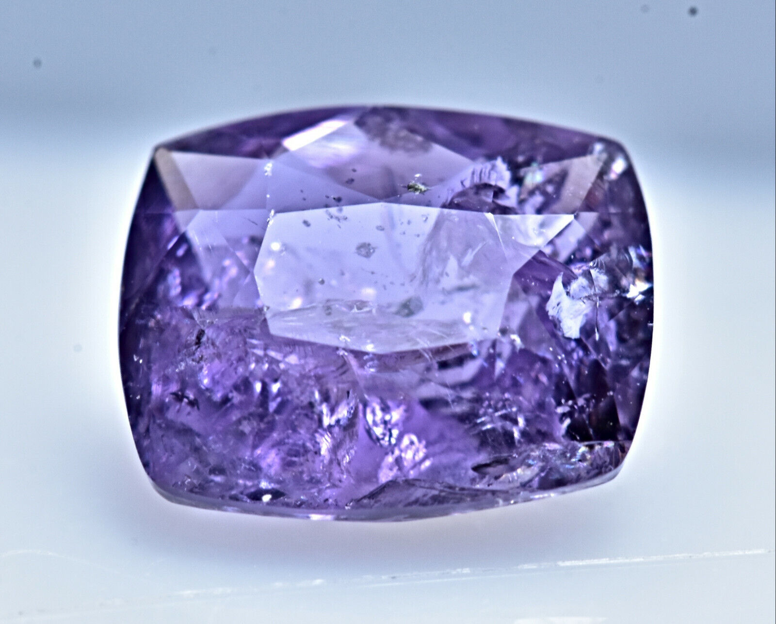 1.60 Carat Faceted Fluorescent Purple Scapolite Gemstone