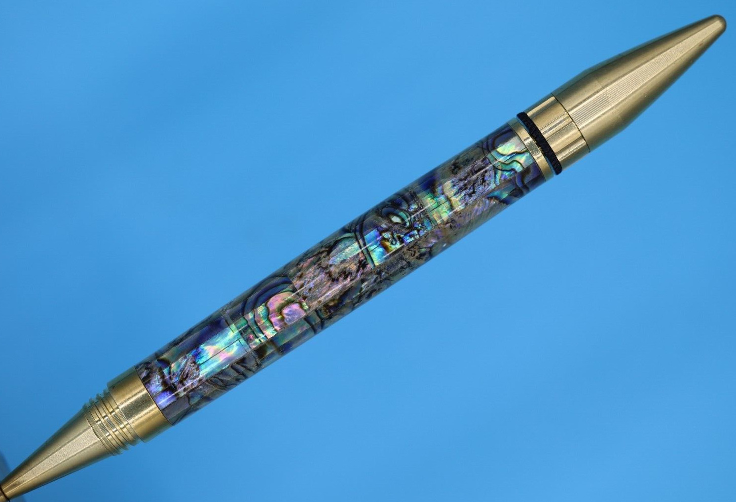Fidget Rollerball Pen in Brass with Iridescent Paua Abalone Shell