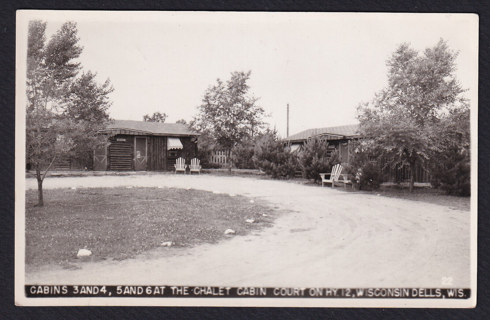 Wisconsin Dells-Real Photo-Chalet Cabin Court-Hwy 12-Vintage RPPC Postcard