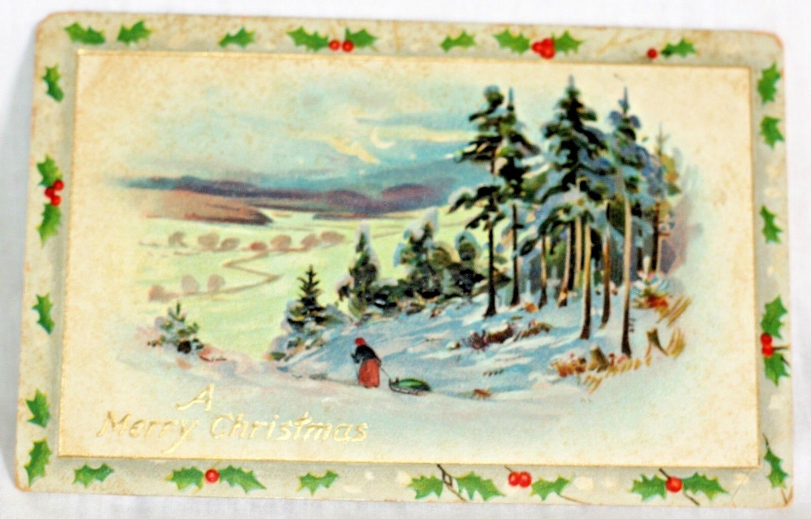 Tucks Postcard A Merry Christmas Embossed Winter Scene Trees Woman Sled Vtg