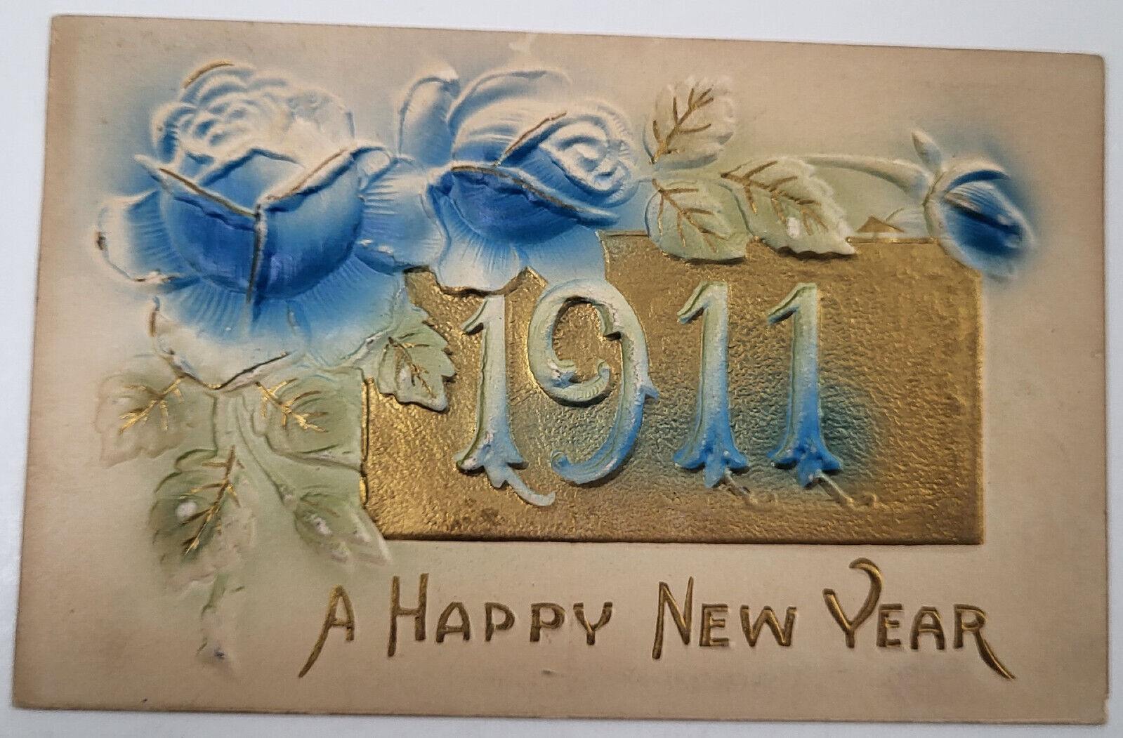 1909 YEAR DATE HAPPY NEW YEAR\'S POSTCARD BAS RELIEF BLUE ROSES W/ GOLD ACCENTS