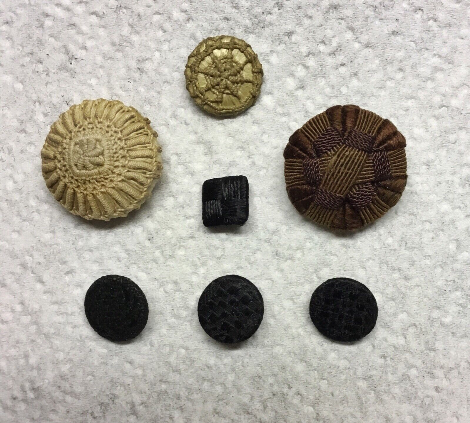 7 Vintage Woven Buttons. 