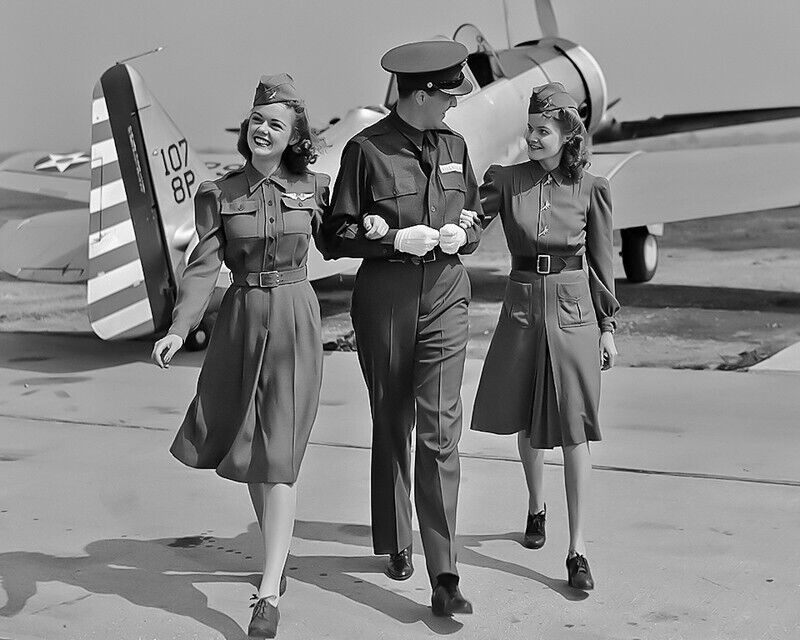 8x10 vintage image of Two Female Stewardesses with a Male Stewardess. (1940s)