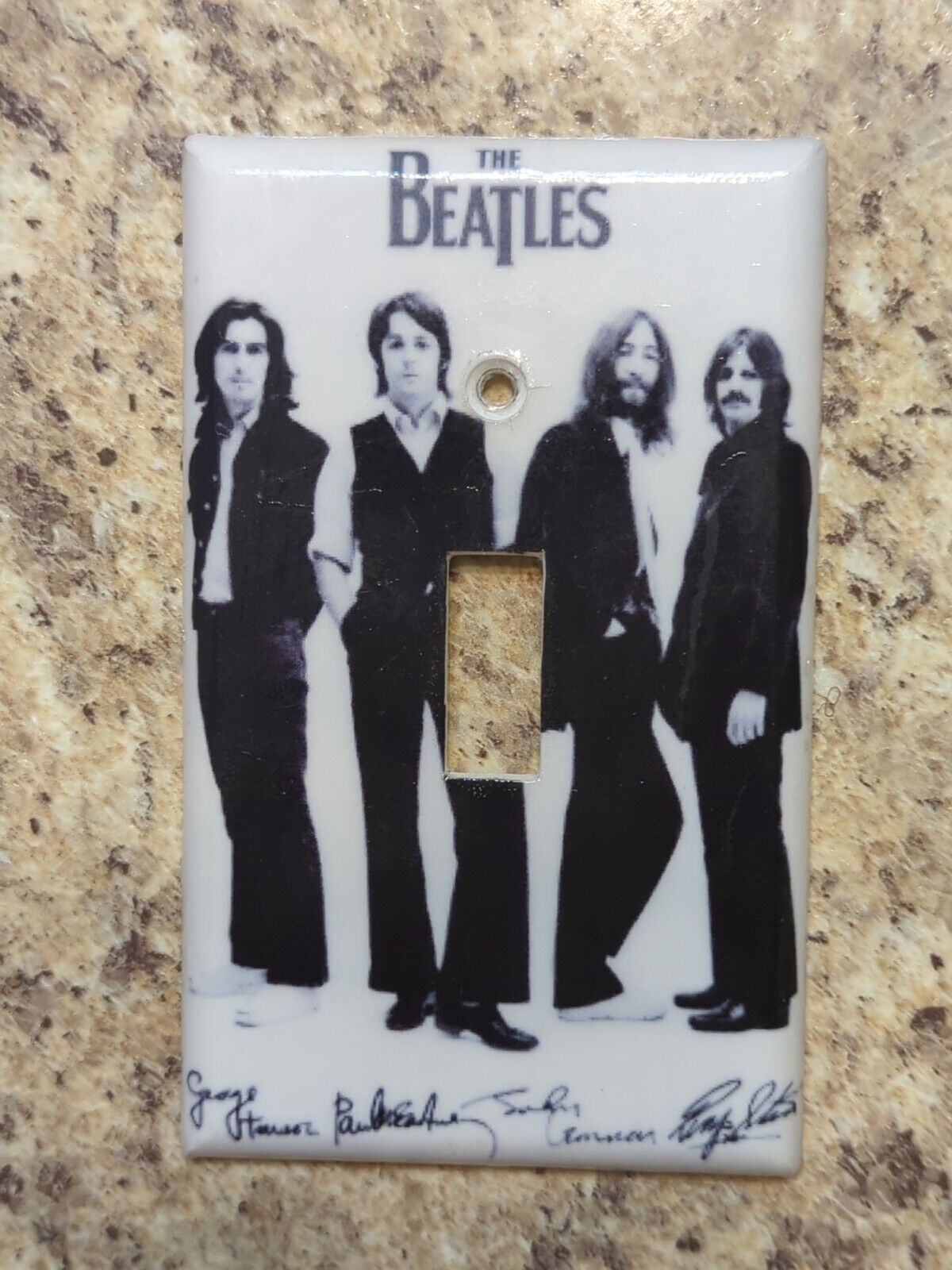 The Beatles inspired black and white light switch cover
