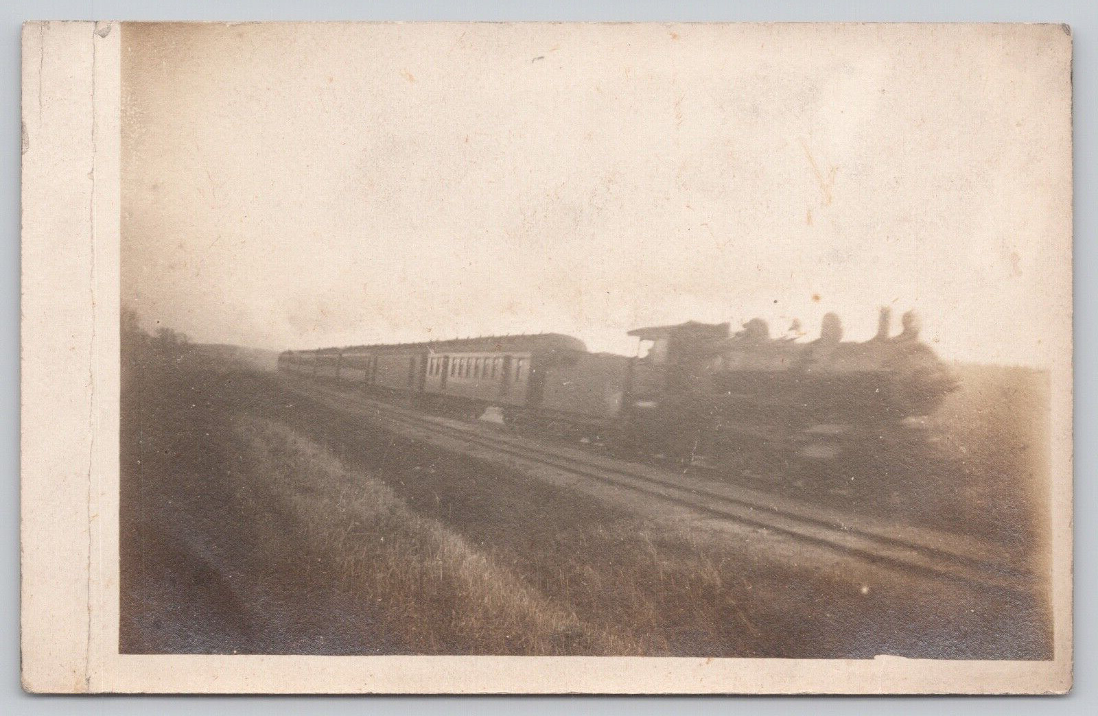 UNIDENTIFIED STEAM ENGINE TRAIN IN MOTION ON RAILROAD TRACKS REAL PHOTO c 1910s