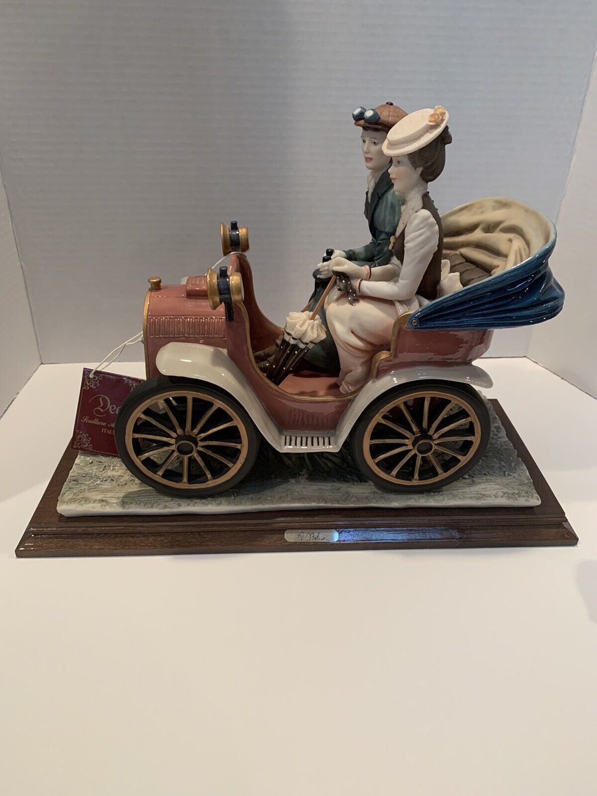 Large Rare Capodimonte Motoring Figural Group signed and with tag