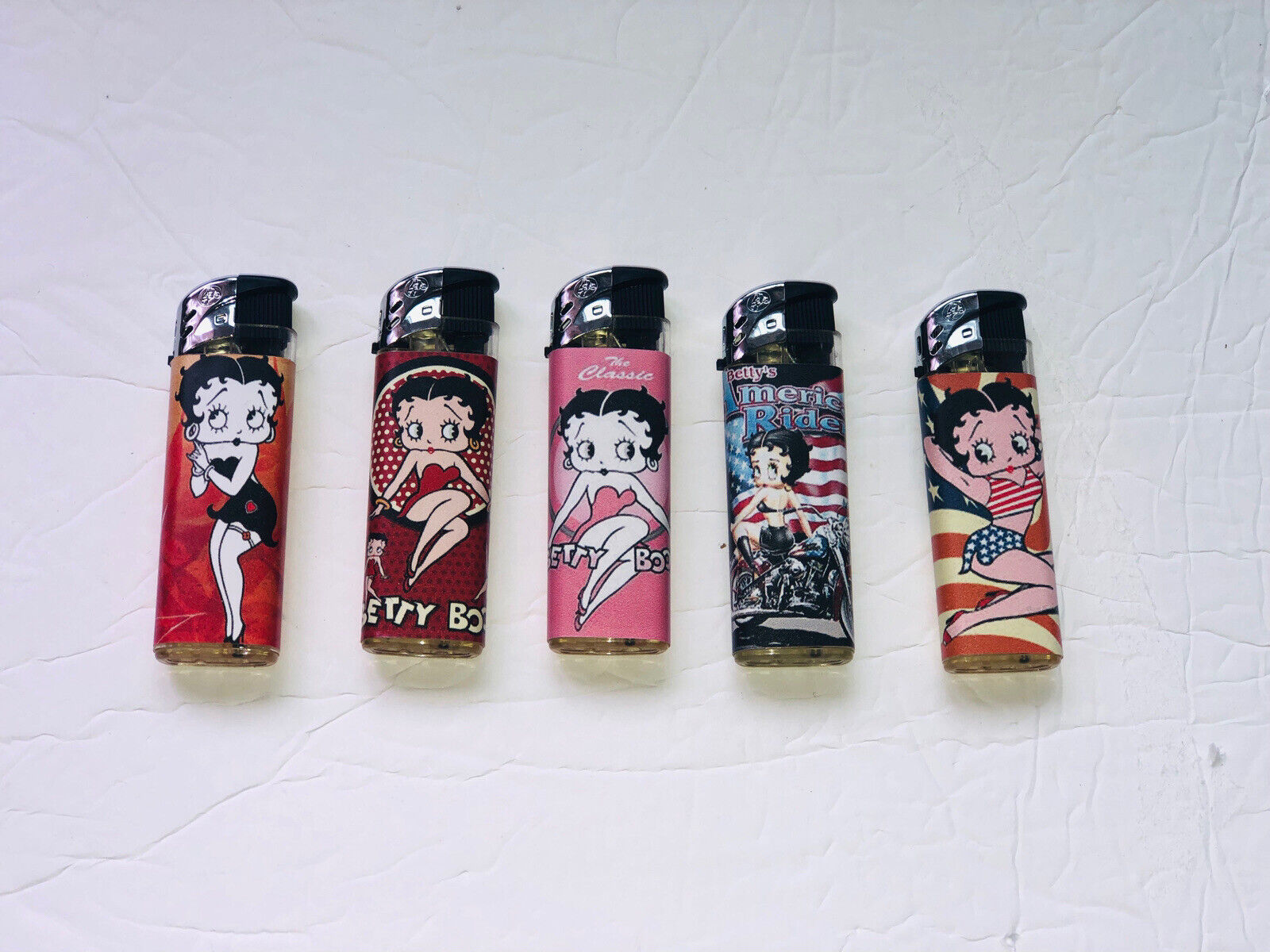 BETTY BOOP SET OF 5  ELECTRONIC LIGHTERS 