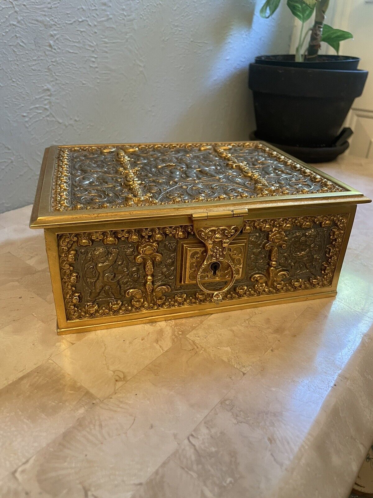 Late 19thC/Early 20thC Brass Putti Themed Casket Box With Latched Lid - 8x3x7/34
