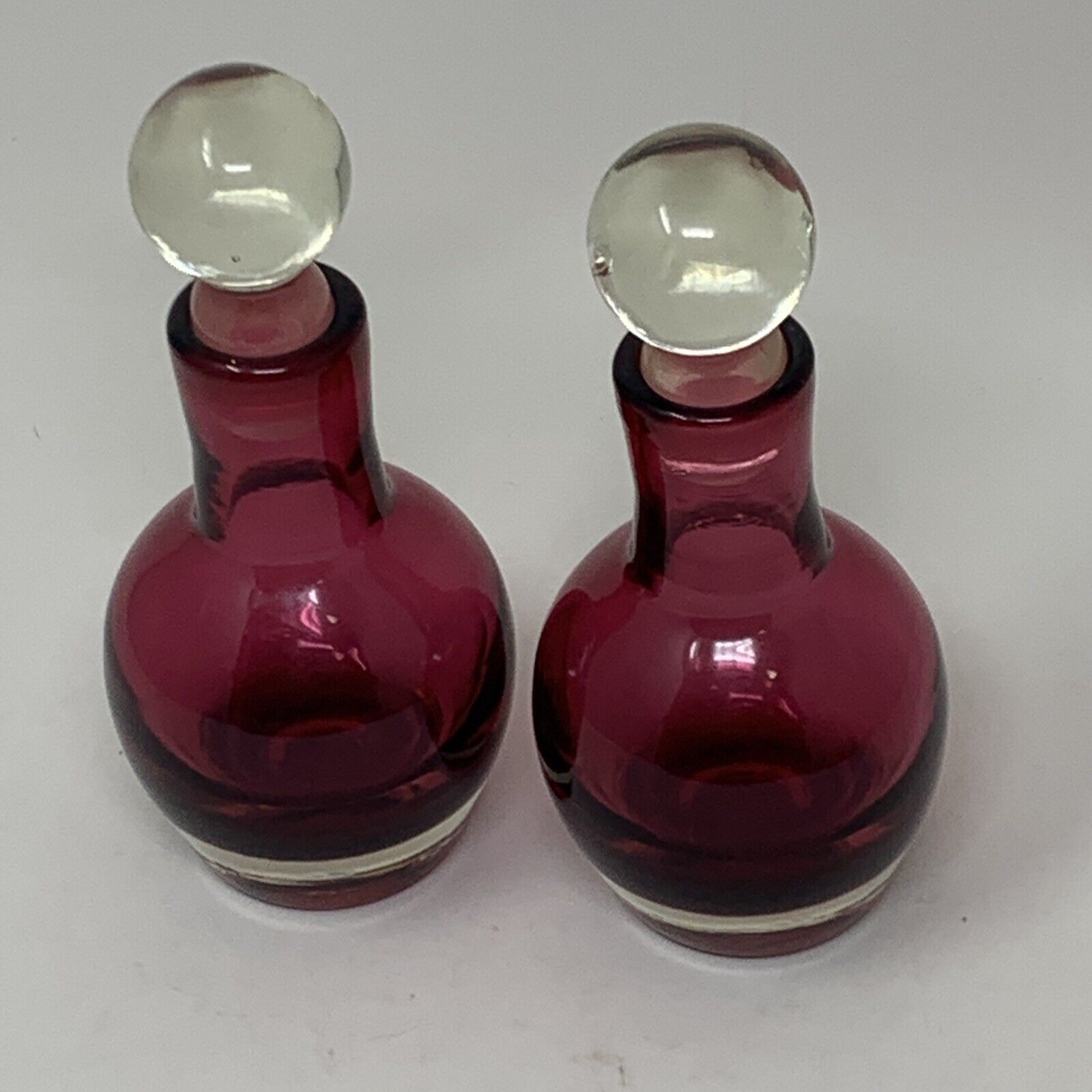 Two Dark Cranberry Ruby Red Glass Perfume Bottles Clear Ground Glass Stoppers