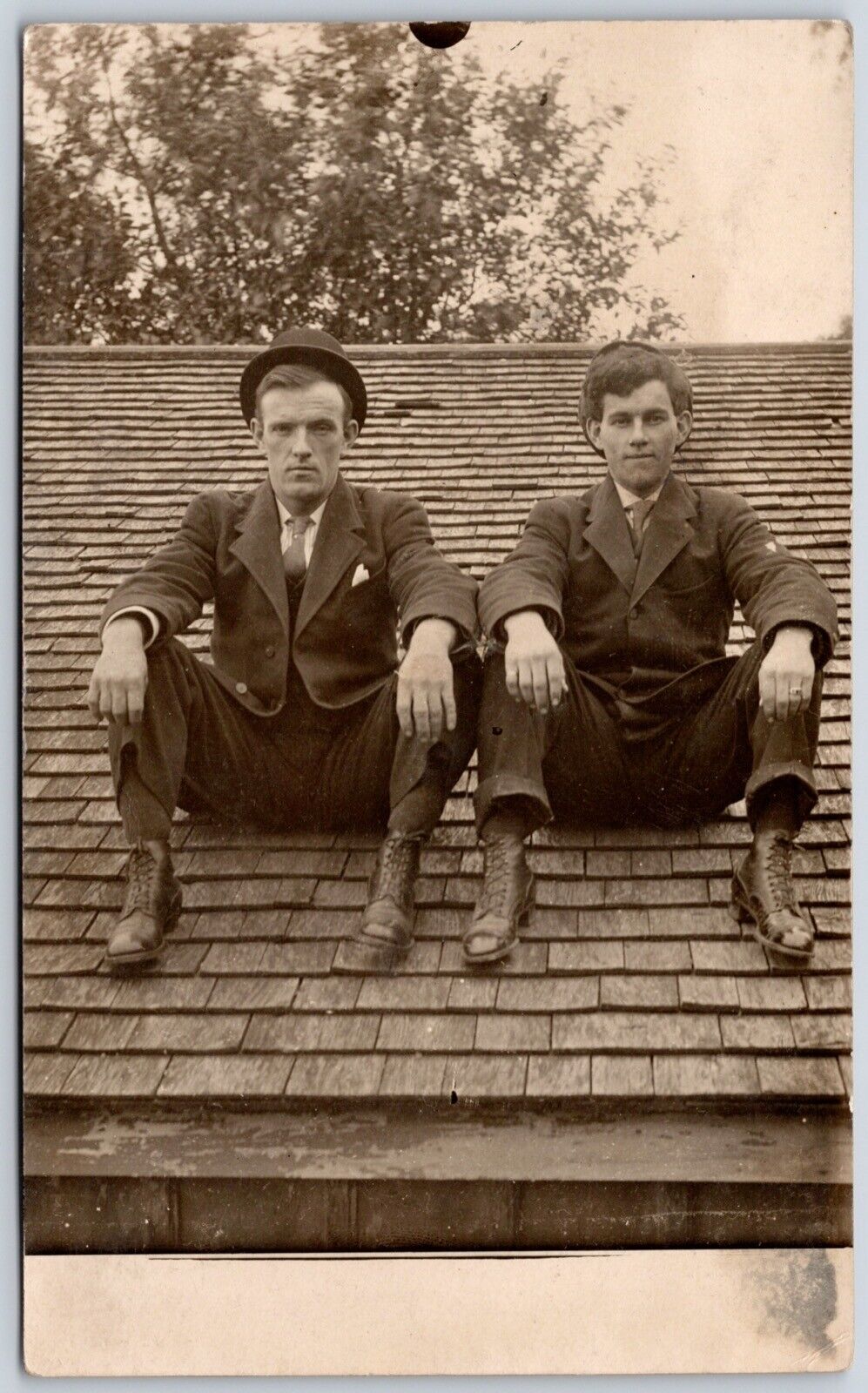 Postcard RPPC c1910s 2 Men Sitting on a Shingled Roof Bowler Hat