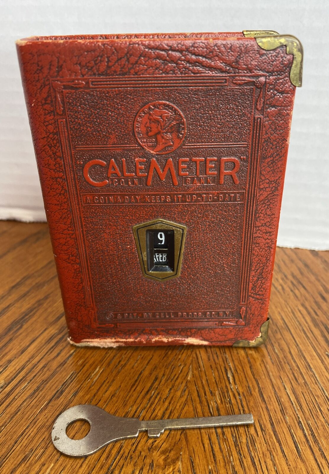 Antique Cale Meter “Zale”  Coin Bank Book Calendar Saving Bank Orig.  Key