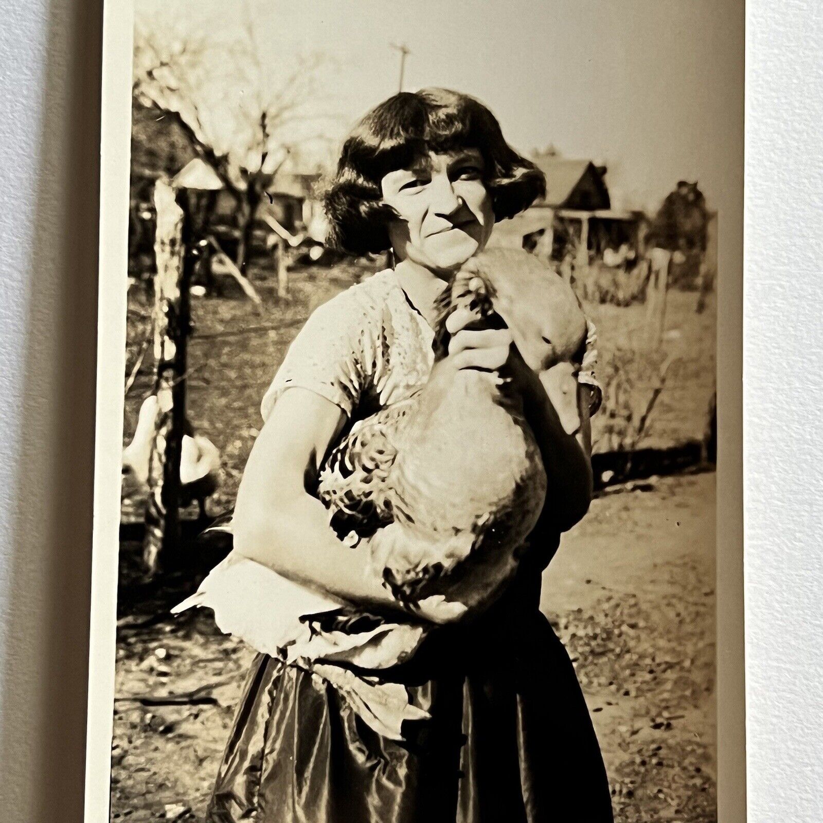 Vintage Sepia Snapshot Photograph Woman Holding Big Silly Goose Odd Farm Life