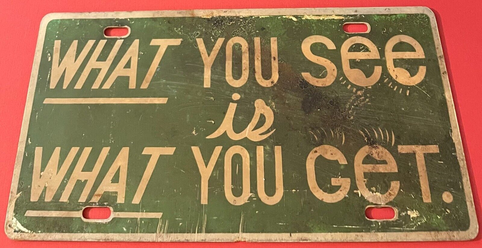 Vintage What You See Is What You Get Booster License Plate PLASTIC