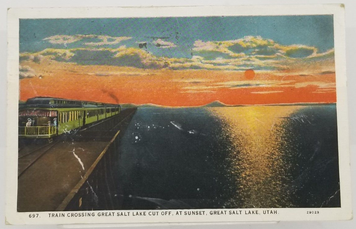 UTAH Salt Lake Train Crossing Great Lake at Sunset c1929 UT Postcard